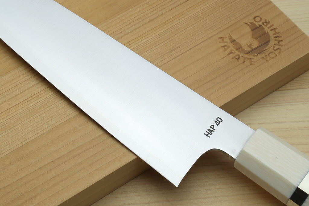 Gyuto chef knife with HAP 40 marking, ivory and ocean blue handle, stainless blade