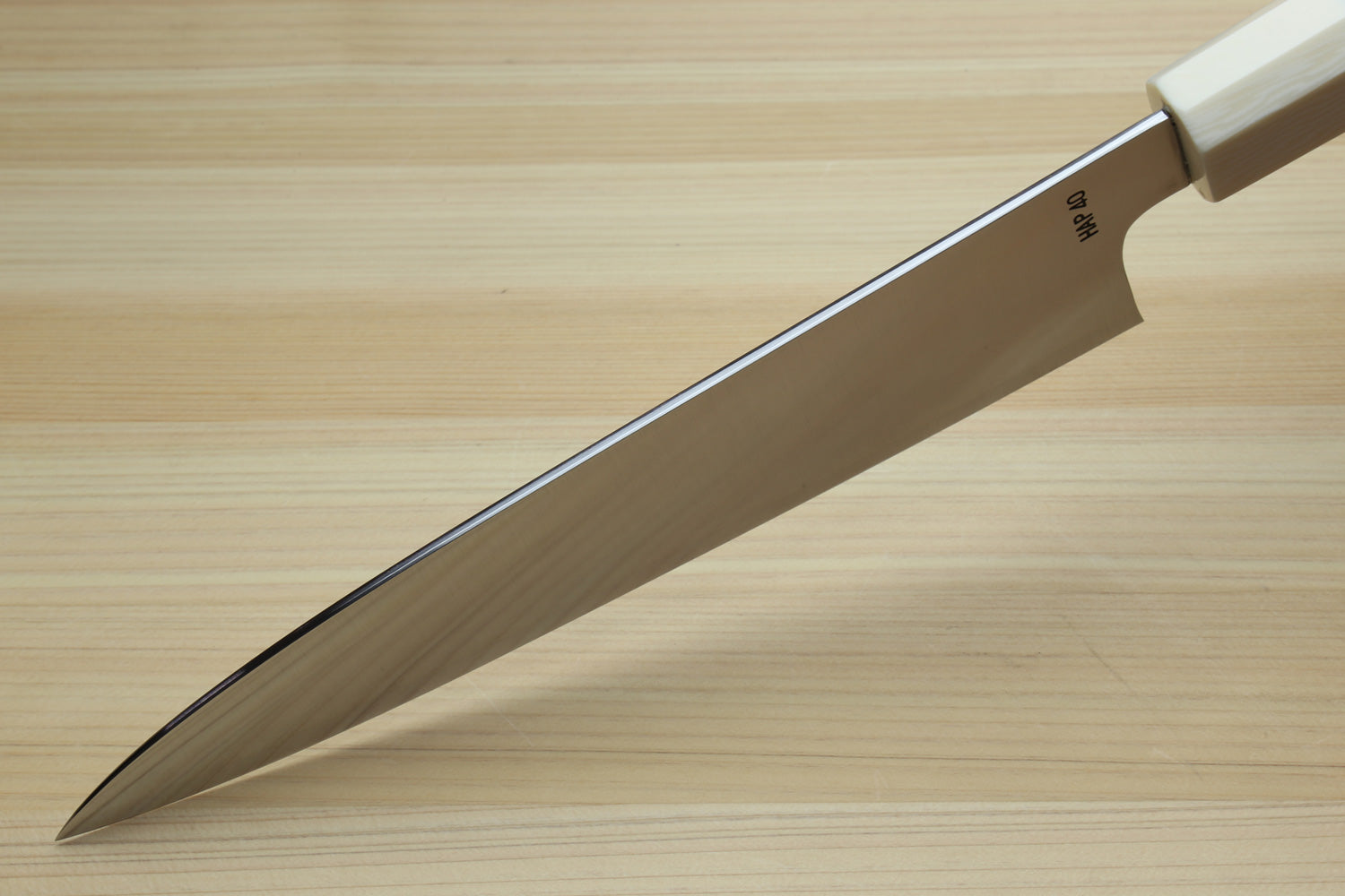 Gyuto chef knife side profile, ivory and ocean blue handle with stainless steel blade