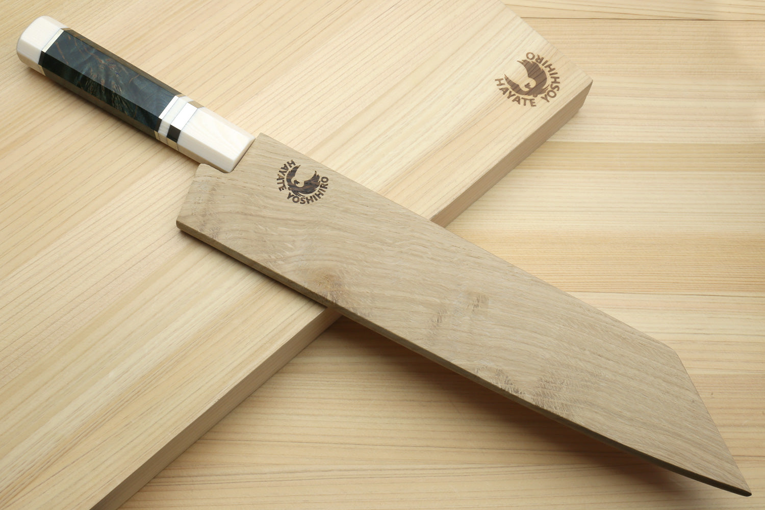 Kiritsuke chef's knife with ocean blue handle, ivory bolster, and stainless steel blade