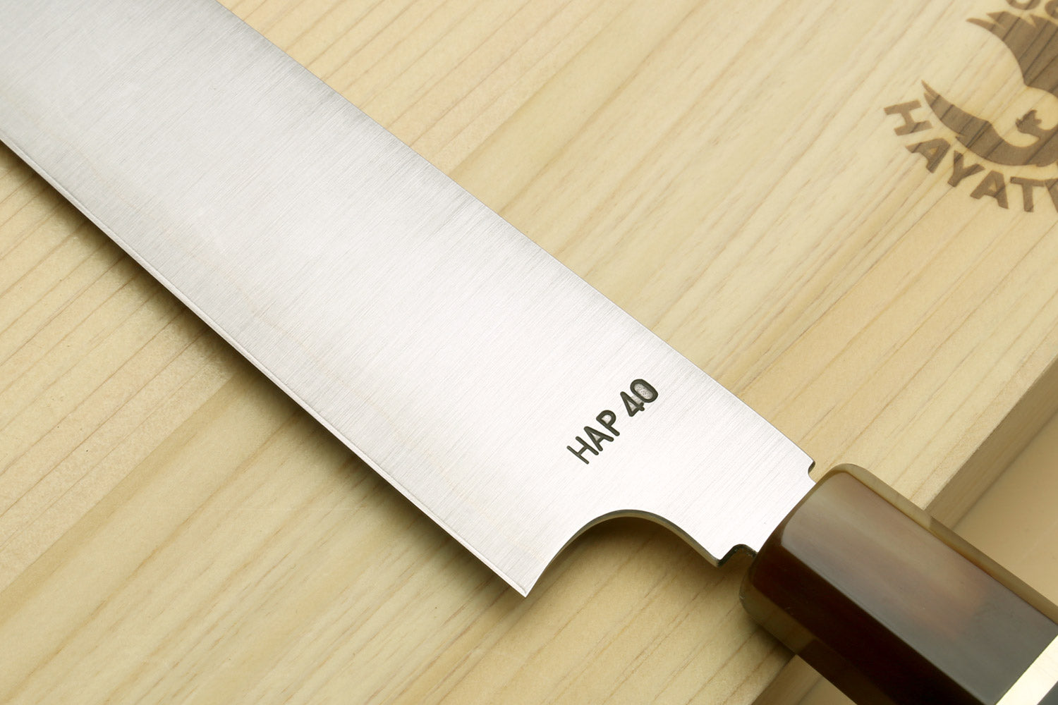 Sujihiki-kiritsuke slicer knife with “HAP 40” marking and wooden handle