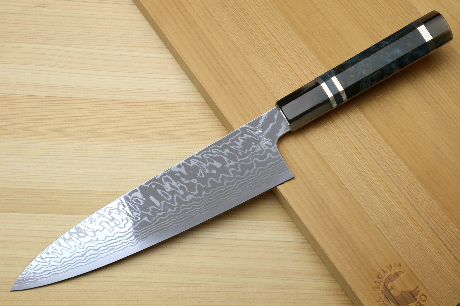 Gyuto chef knife with damascus blade, ocean blue handle and striped bolster