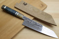 Damascus kiritsuke chefs knife with ocean blue handle and sharp pointed blade