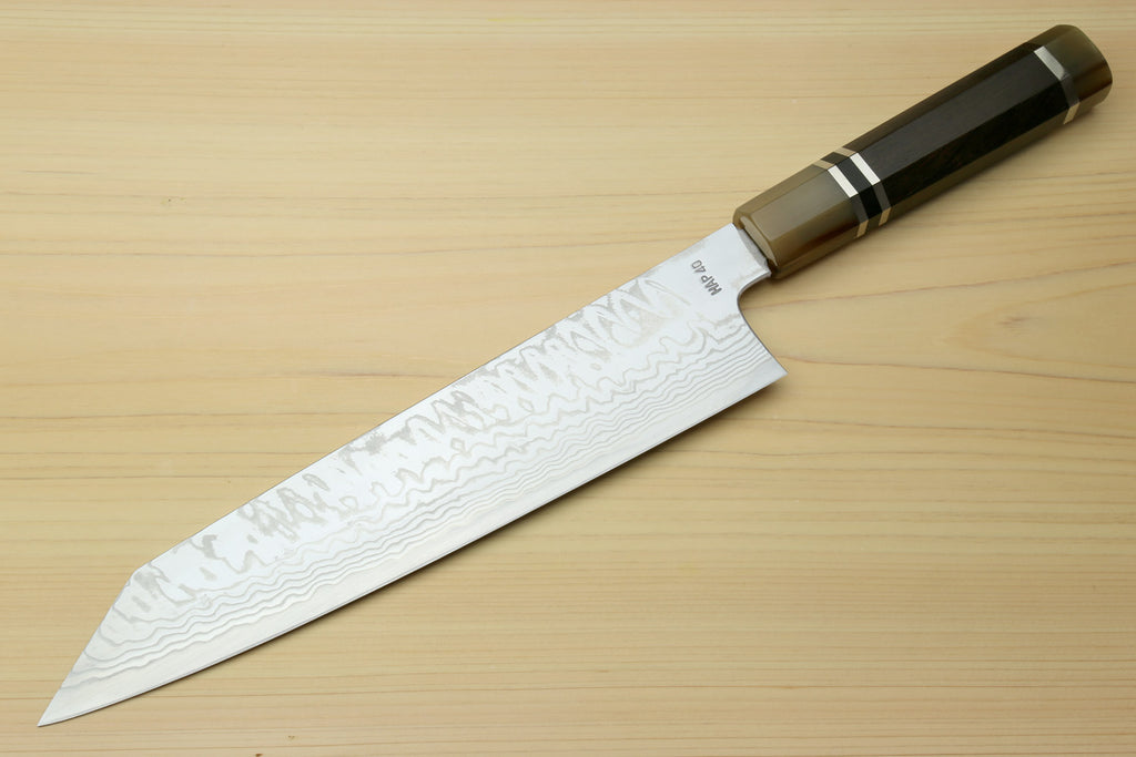Kiritsuke chef's knife, white damascus blade with wavy pattern and dark octagonal handle