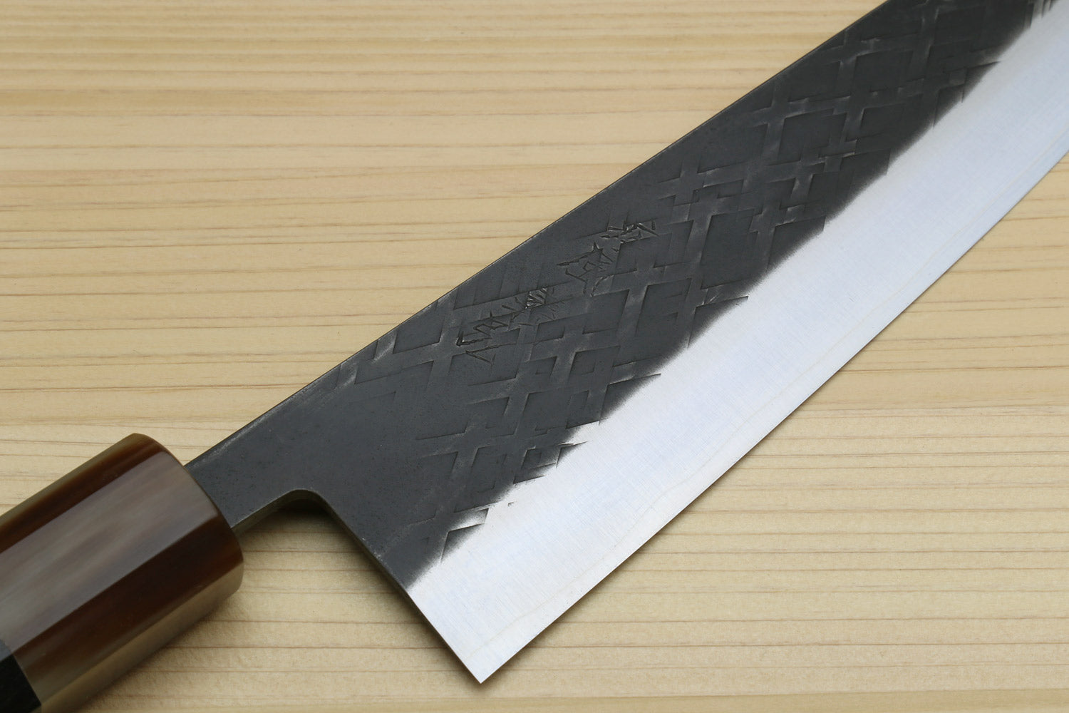 Kiritsuke chef knife blade, dark hammered finish with silver cutting edge