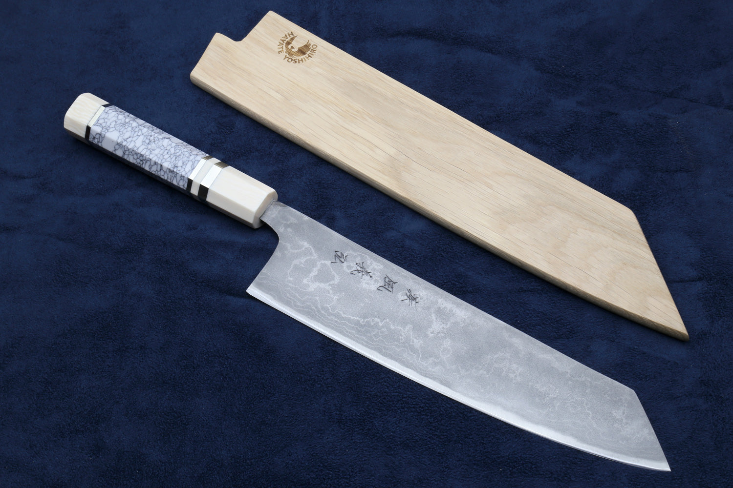 Chef knife with silver damascus blade, white howlite handle and wooden sheath