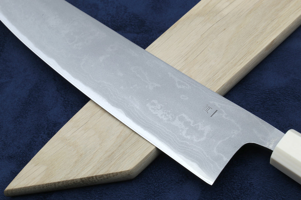 Japanese chef knife with silver damascus blade, white howlite handle, ivory bolster