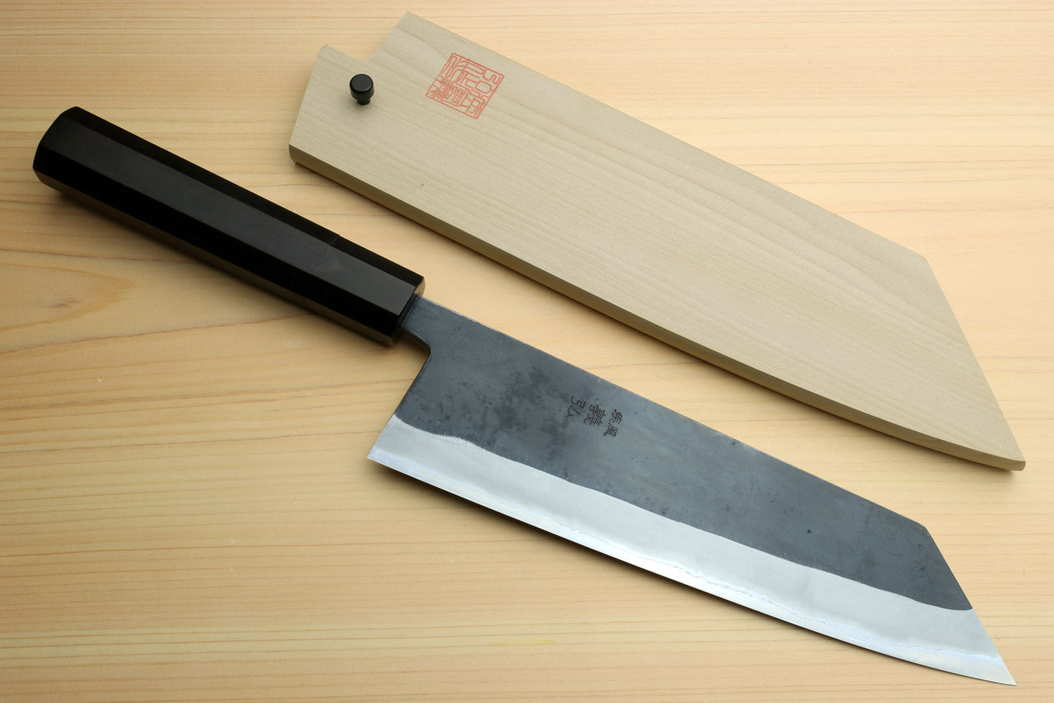 Kiritsuke chef knife with ebony handle, paired with light wood saya cover