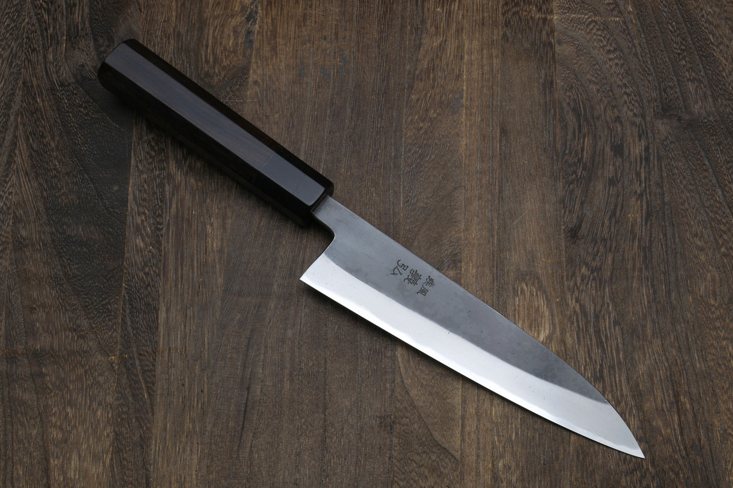 Yoshihiro Kurouchi petty utility knife with dark handle and stainless blade