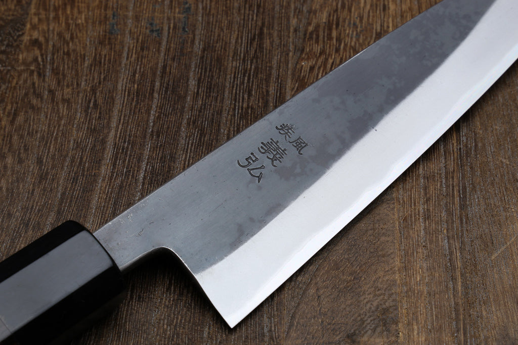Yoshihiro Kurouchi petty utility knife close-up of blade and dark handle