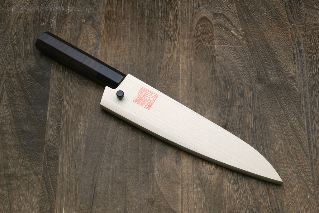Petty-kiritsuke knife with dark blade and ebony wood handle, full side view