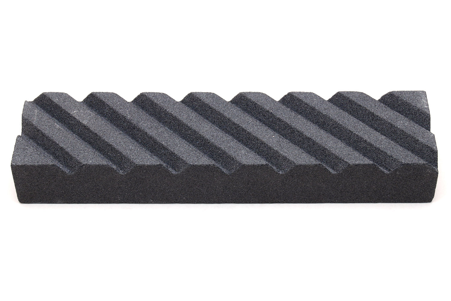 Sharpening stone fixer, black ribbed wedge block with stepped ridges