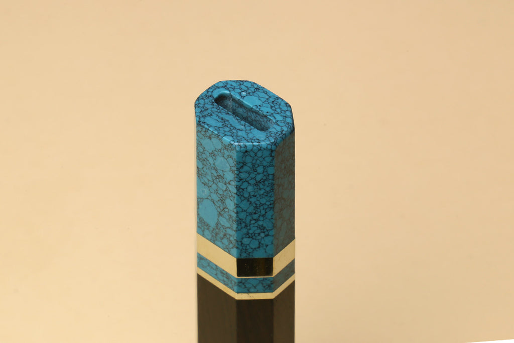 Turquoise blue knife handle with dark wood and white stripe bands
