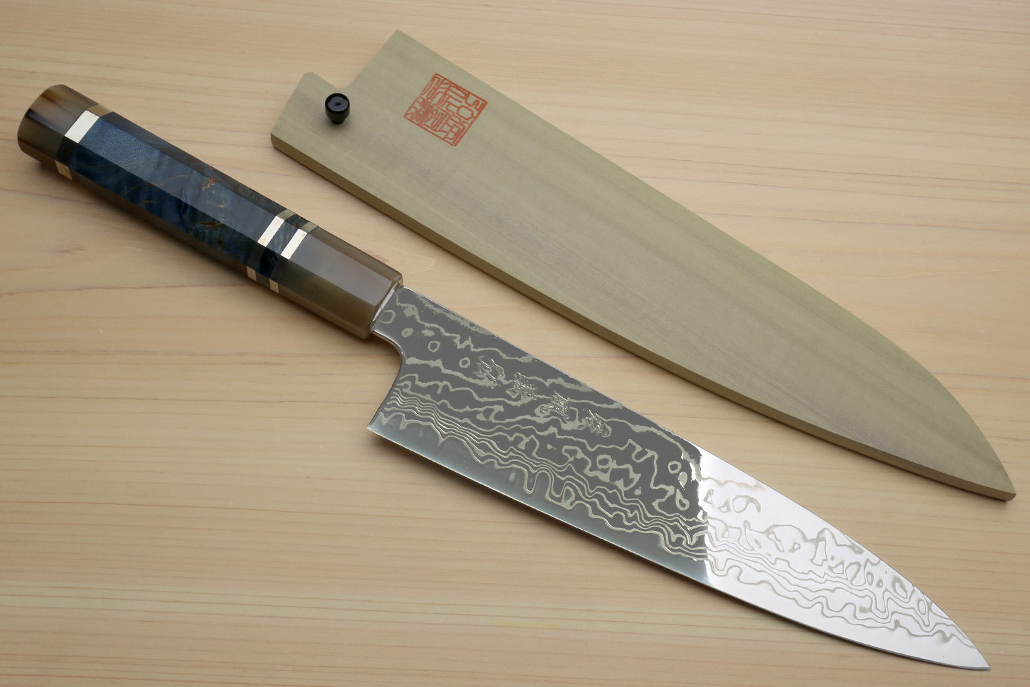 Chef gyuto knife with ocean blue octagonal handle and grey Damascus blade, 210mm