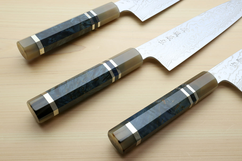 Chef gyuto knives with ocean blue octagonal handles and Damascus steel blades, three views