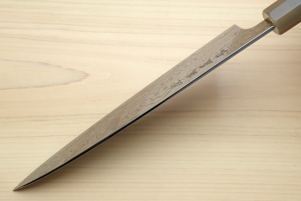 Chef gyuto knife side view with Damascus blade and ocean blue octagonal handle