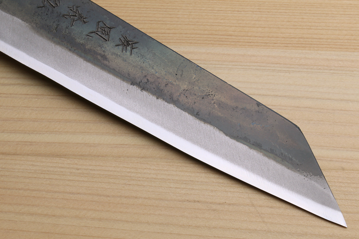 Japanese utility knife blade with kurouchi finish and pointed tip, ebony handle