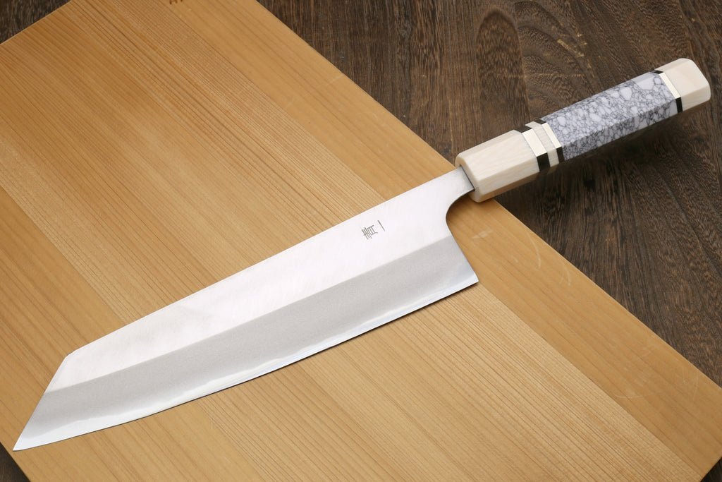 Japanese chef knife, angled silver blade with white howlite handle