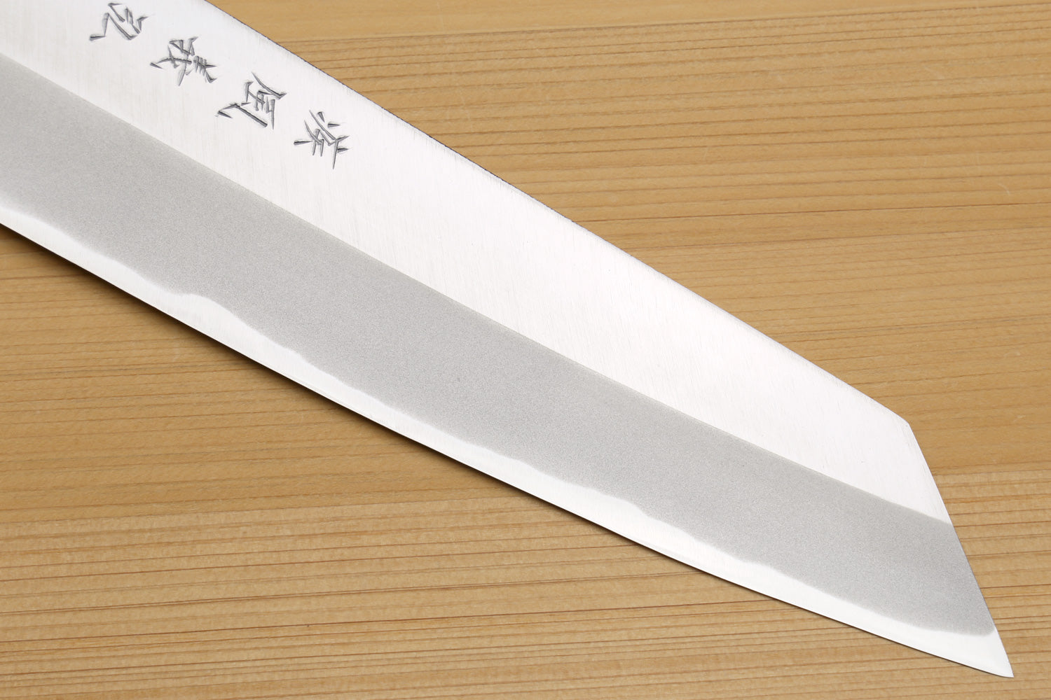 Japanese chef knife, long pointed silver blade with etched characters
