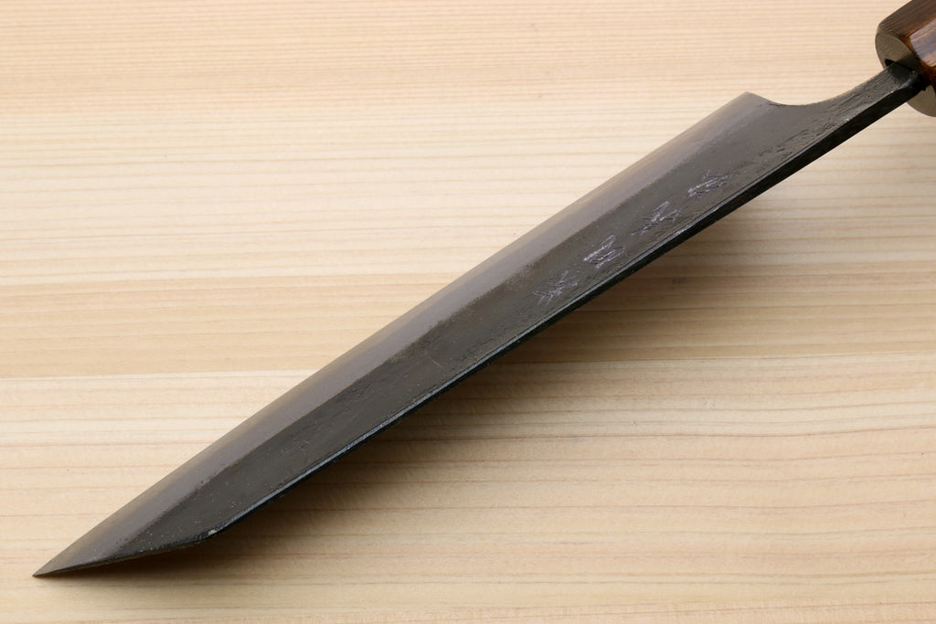 Utility knife blade side view with dark finish and tapered point