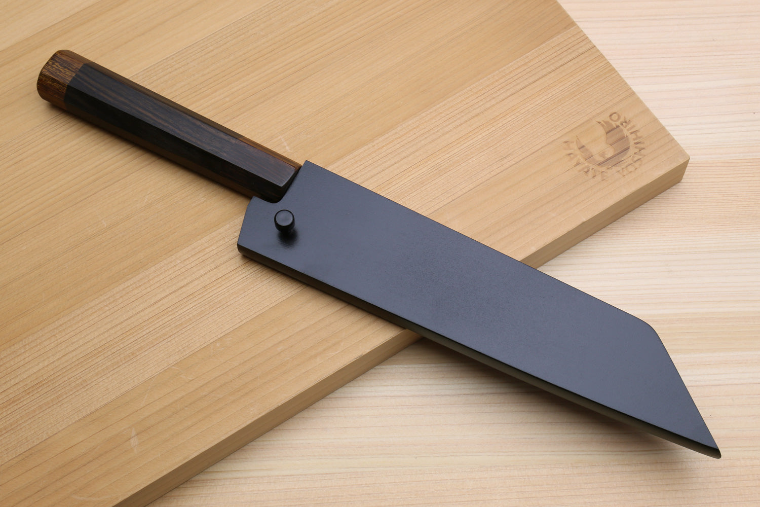 Utility knife with dark blade and ebony handle, shown with sheath cover
