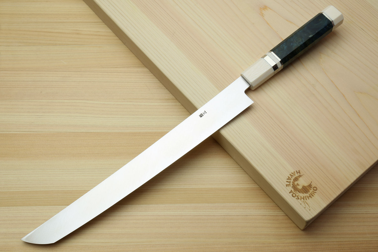 Sakimaru sushi slicer knife with mirror-polished steel blade, dark blue handle, ivory bolster