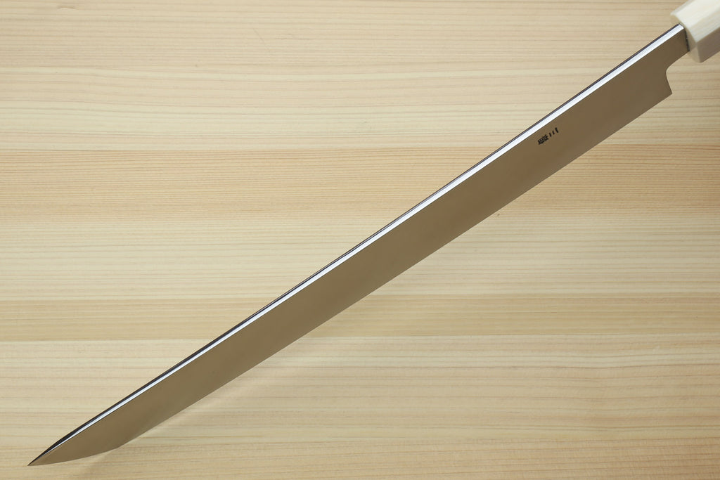 Sakimaru sushi slicer knife long edge view with mirror-polished steel blade and ivory bolster