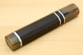 Chef knife handle side view with horn bolster and triple ring stripes in dark ebony
