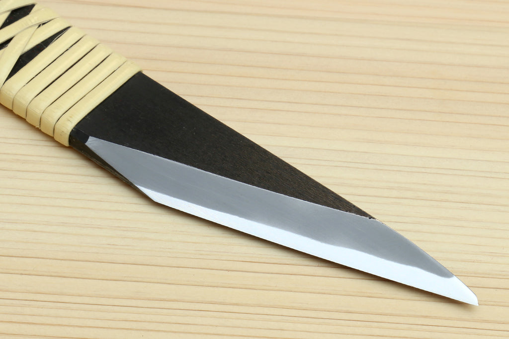 Kiridashi utility knife with ribbed beige handle and silver steel blade