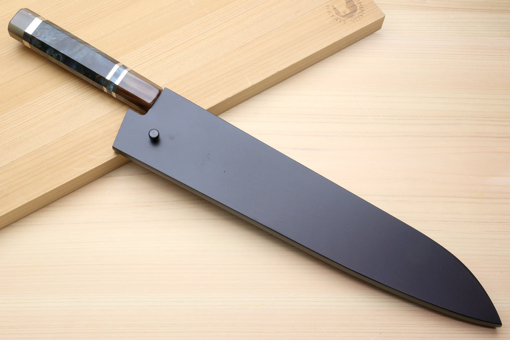 Gyuto chef knife with polished blade, flat spine, and dark wooden handle