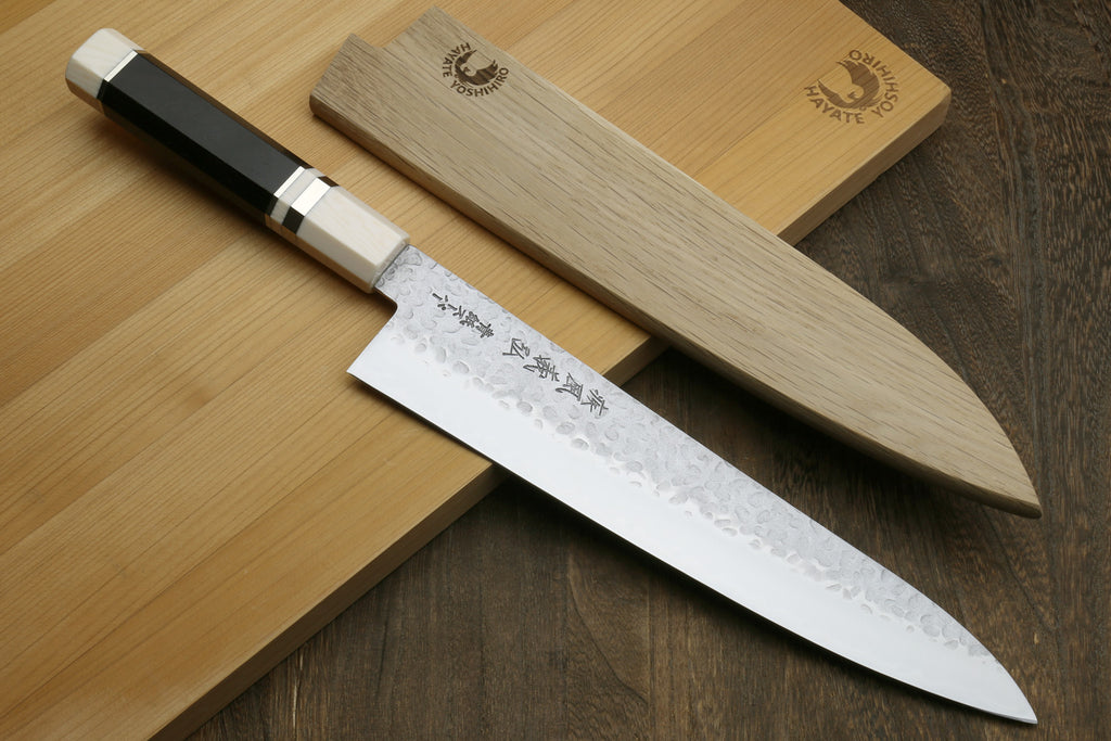 Gyuto chef knife, hammered blade with etched kanji, ebony handle and ivory bolster