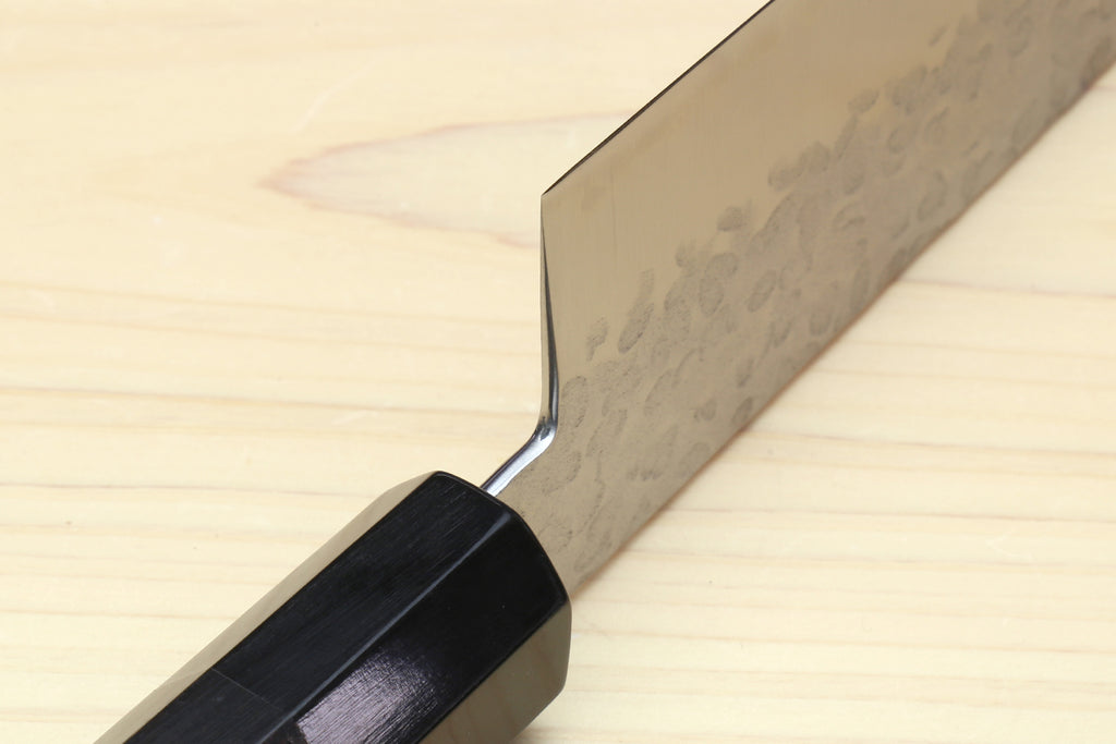 Gyuto chef's knife with ebony handle and hammered stainless blade edge