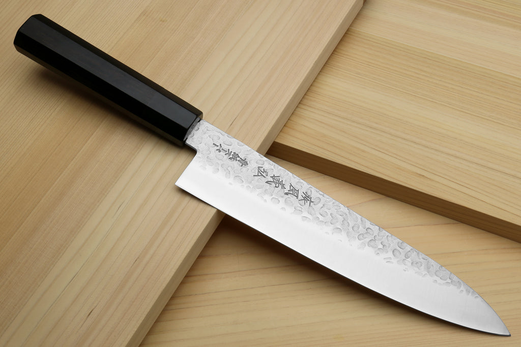 Hammered stainless gyuto chef's knife with ebony handle, exposed blade