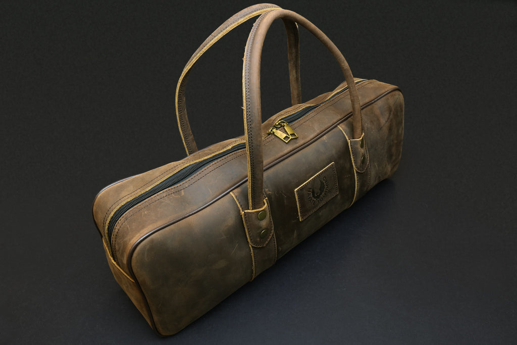 Brown natural leather knife culinary bag with top handle and front strap detail