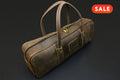 Natural leather knife bag with handle and zip, dark brown, brass hardware