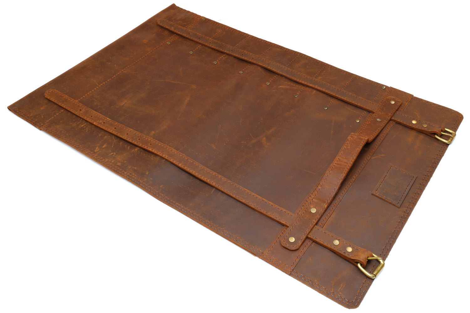 Brown leather knife roll case with long outer flap and brass buckle straps