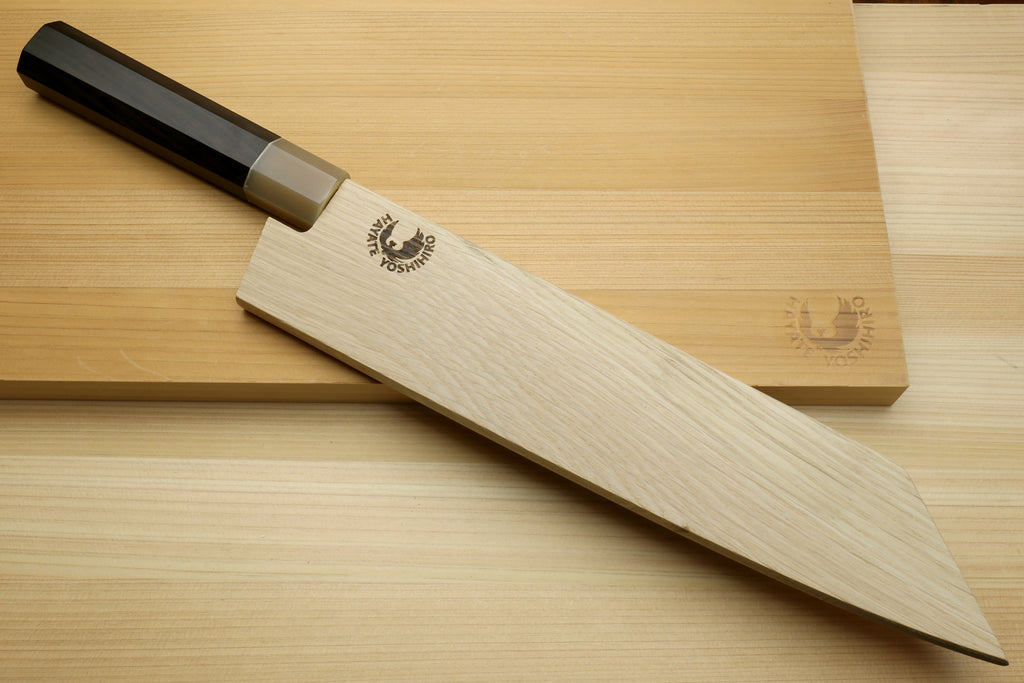 Kiritsuke chef knife with light wood saya cover, dark handle and silver-edged blade