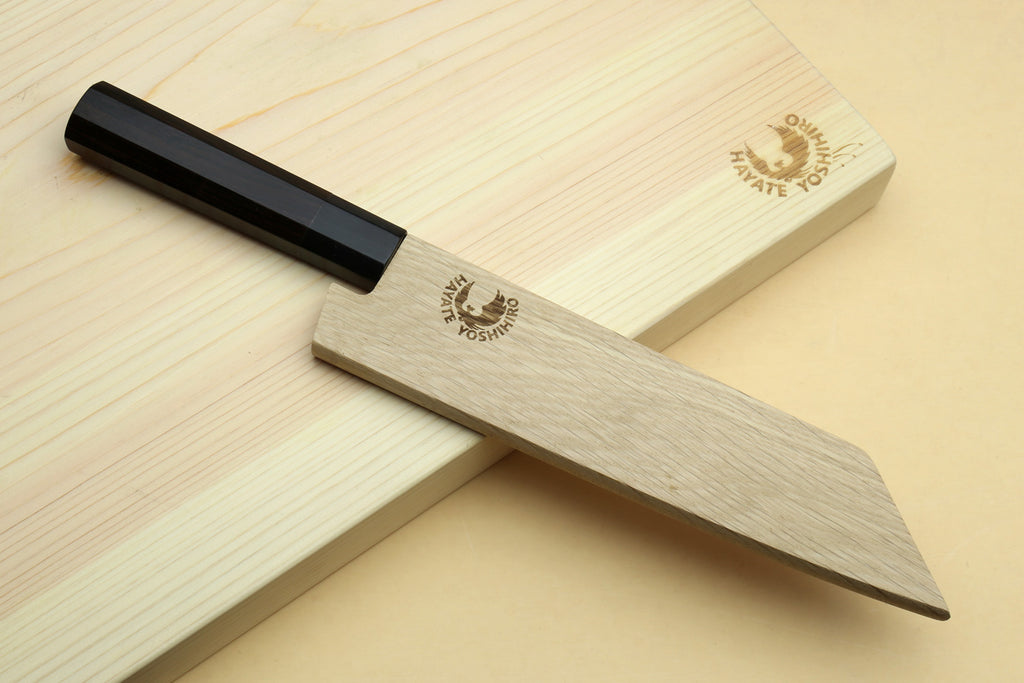 Ebony-handled utility boning knife with dark steel blade and pointed tip