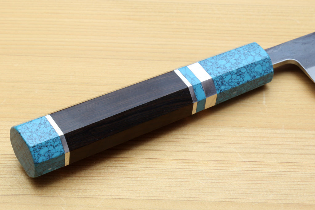 Sujihiki slicer knife with turquoise handle and dark straight blade profile