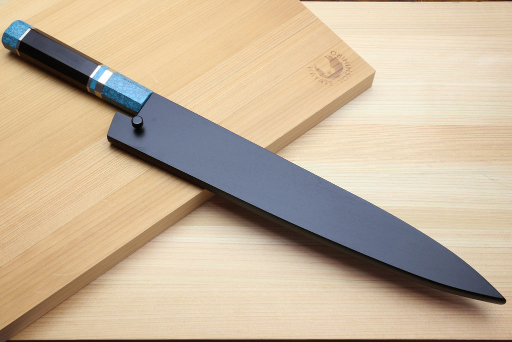 Sujihiki knife with turquoise handle, dark cover, and full pointed blade