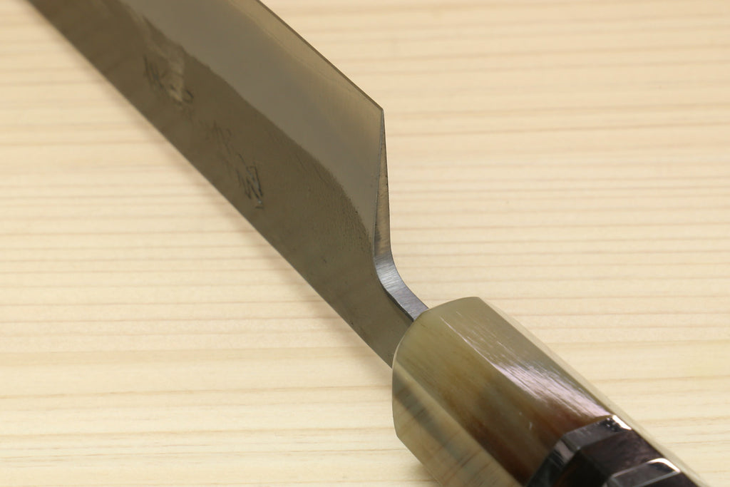 Kiritsuke slicer knife tip and bolster with dark handle and silver blade