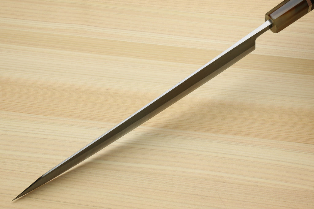 Kiritsuke slicer knife with slender pointed silver blade and black handle