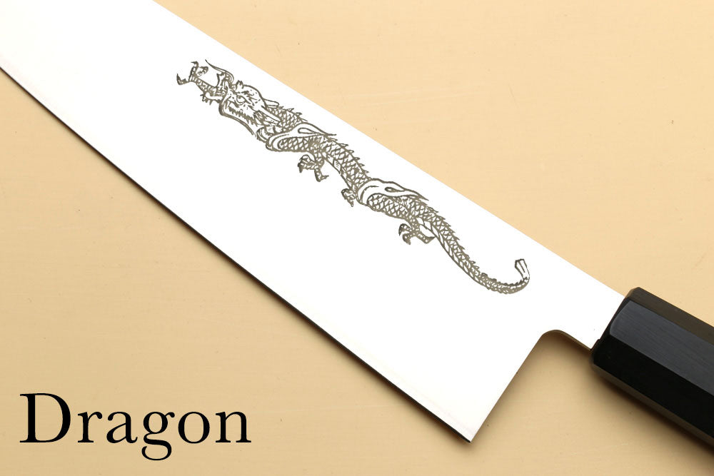 Dragon engraving on white card with black edge tool at corner