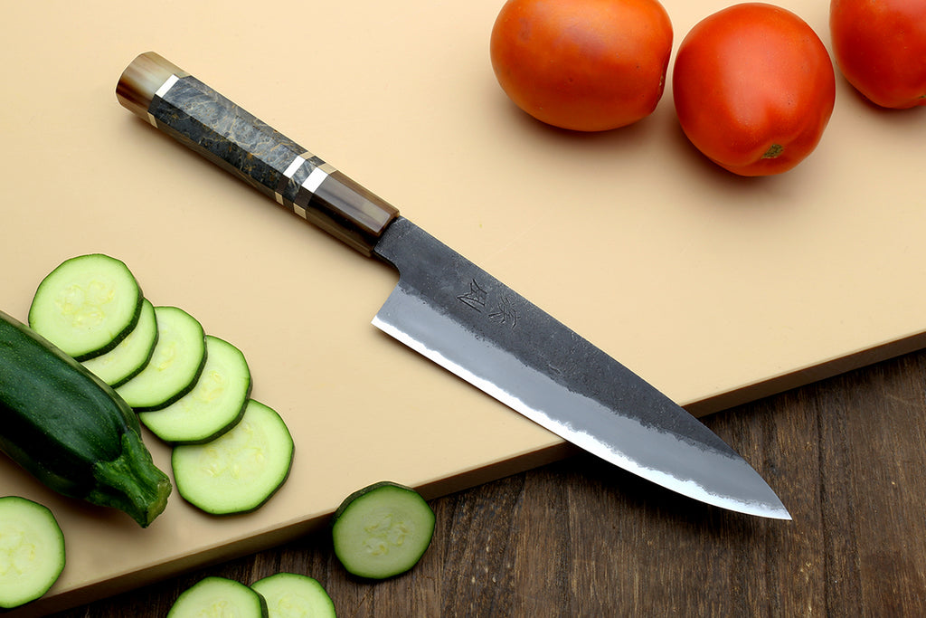 Petty utility knife with dark blue steel blade and wooden handle