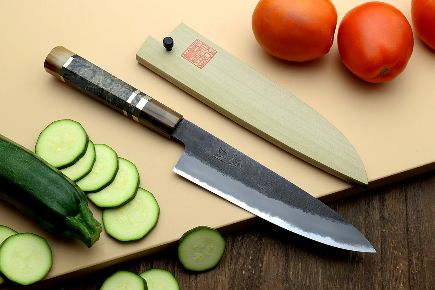 Petty utility knife with dark blue steel blade and wood handle