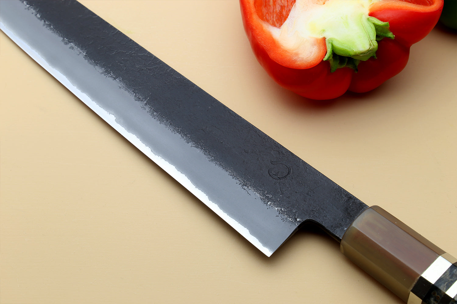 Sujihiki slicer knife blade and bolster, dark blue steel with patterned handle