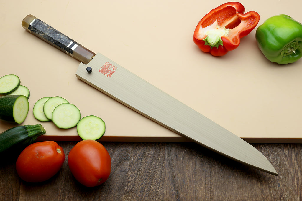Hayate Hinoura kurouchi sujihiki slicer knife, blue steel clad blade and wood-toned handle