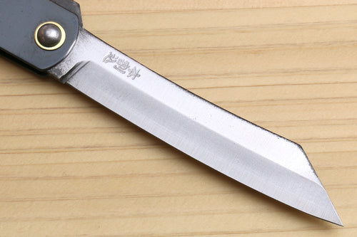 Pocket knife blade close-up with stainless finish and etched markings