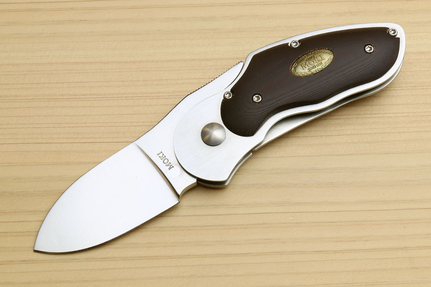 Folding pocket knife with stainless blade and dark brown matte handle