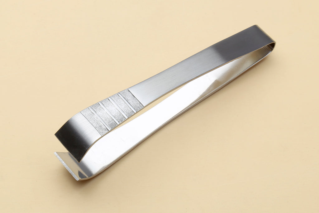 Stainless steel non-slip tweezer tool with textured grip and pointed jaws