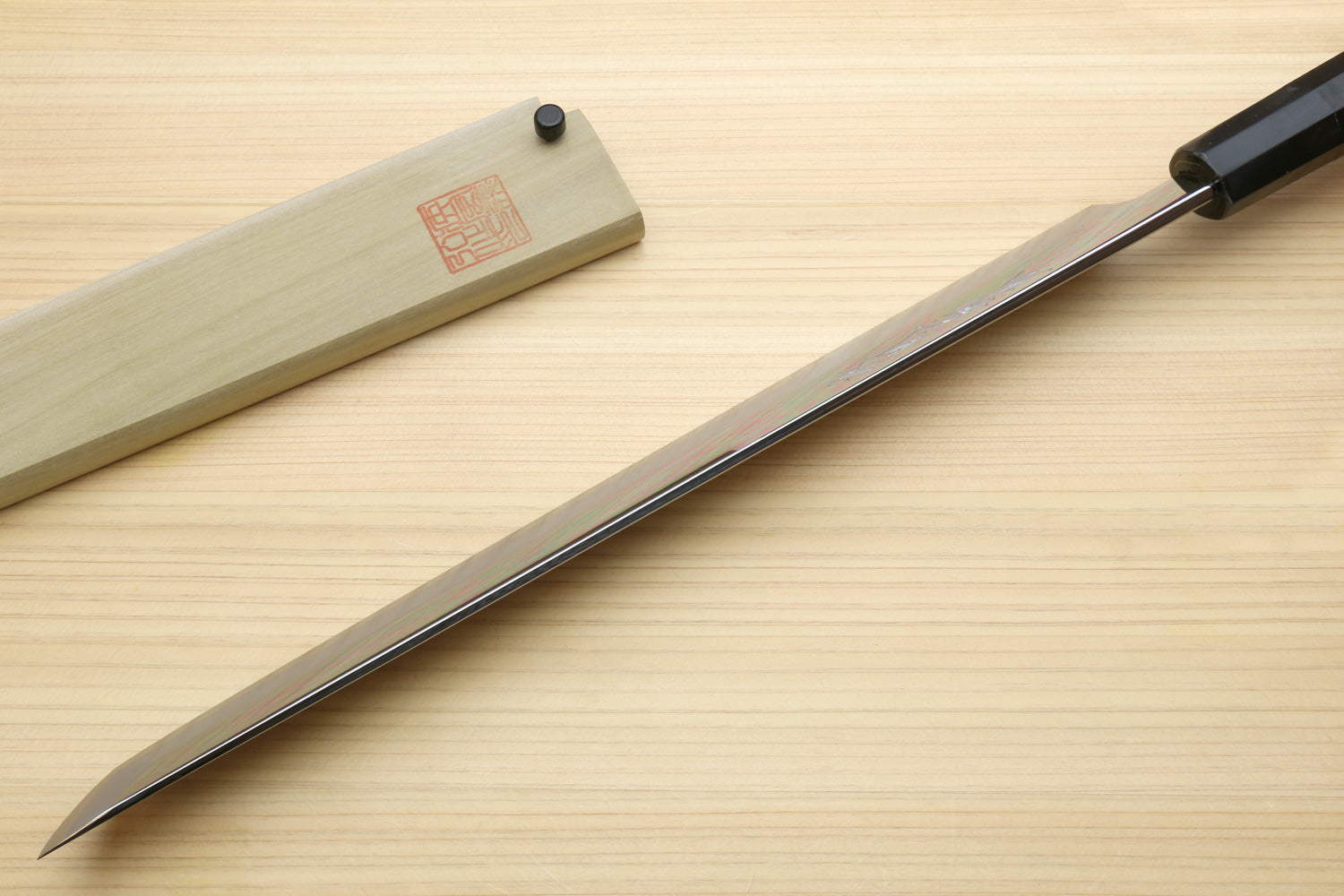 Sakimaru sushi knife with long pointed blade and ebony handle, mirror finish